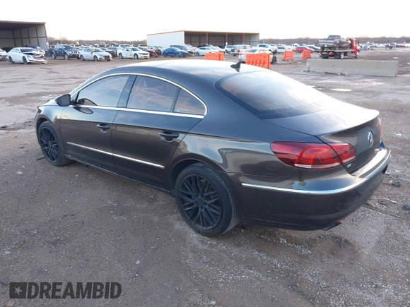 2015 Volkswagen CC Lux with VIN WVWRP7AN9FE819154, listed as a IAAI auction lot 41669832 with 151,142 mi miles. Bid and sale history available at carsss.com. Image 3.