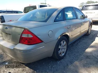 2006 Ford Five Hundred SEL with VIN 1FAFP24126G117587, listed as a IAAI auction lot 42058825 with 183,380 mi miles. Bid and sale history available at carsss.com. Image 4.
