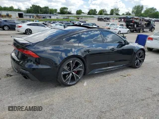 2022 Audi RS 7 z VIN WUAPCBF27NN905150, wystawiony jako Copart lot #55993395 z przebiegiem 30 948 mil mil oraz Szkody całkowita. Historia ofert i sprzedaży dostępna na DreamBid. Obrazek 3.