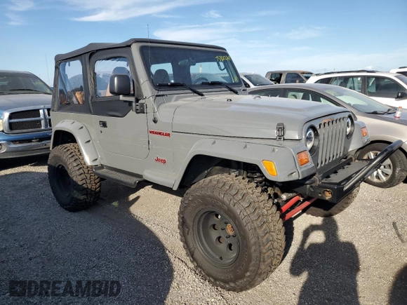 1997 Jeep Wrangler Sport with VIN 1J4FY19S5VP520801, listed as a Copart auction lot 75301274 with Not Provided miles and Non Repairable. Bid and sale history available at carsss.com. Image 4.