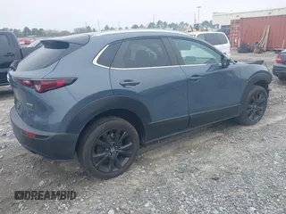 2023 Mazda CX-30 S Carbon Edition with VIN 3MVDMBCM5PM514304, listed as a IAAI auction lot 41795899 with 31,993 mi miles and . Bid and sale history available at DreamBid. Image 4.