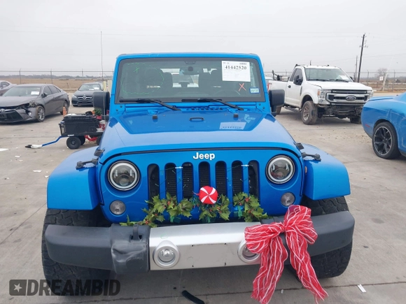 2014 Jeep Wrangler Arctic z VIN 1C4GJWBG3EL313350, wystawiony jako IAAI lot #41442520 z przebiegiem Nie podano mil oraz . Historia ofert i sprzedaży dostępna na DreamBid. Obrazek 12.