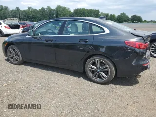 2022 BMW 2 Series 228i with VIN WBA53AK00N7K22579, listed as a Copart auction lot 60313095 with 82,908 mi miles and Salvage title. Bid and sale history available at DreamBid. Image 2.