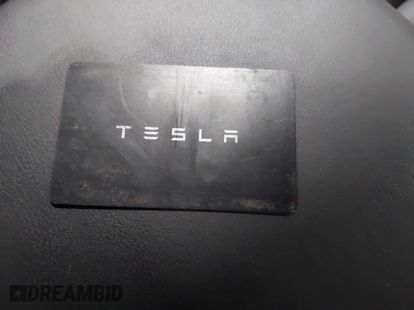 2022 Tesla Model S with VIN 5YJSA1E58NF478403, listed as a IAAI auction lot 41533099 with 42,779 mi miles and . Bid and sale history available at DreamBid. Image 11.