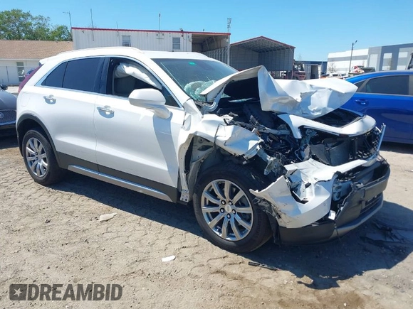 2020 Cadillac XT4 FWD Premium Luxury with VIN 1GYFZCR49LF138493, listed as a IAAI auction lot 41894823 with 49,000 mi miles and . Bid and sale history available at carsss.com. Image 1.