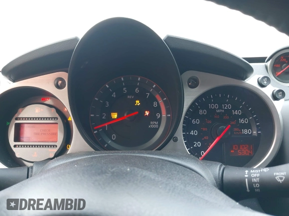 2014 Nissan 370Z Nismo with VIN JN1AZ4EH9EM636306, listed as a IAAI auction lot 41467766 with 101,021 mi miles and . Bid and sale history available at DreamBid. Image 7.