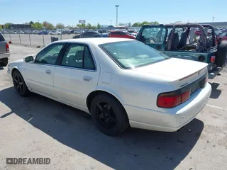 2003 Cadillac Seville Touring STS with VIN 1G6KY54963U110607, listed as a IAAI auction lot 42080691 with 79,605 mi miles. Bid and sale history available at carsss.com. Image 3.