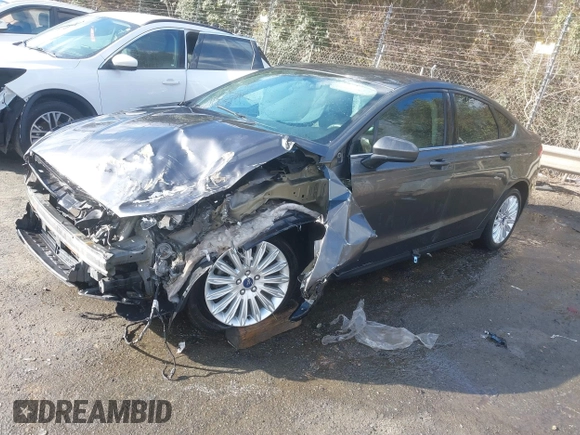 2015 Ford Fusion S Hybrid with VIN 3FA6P0UU9FR283189, listed as a IAAI auction lot 41632307 with 152,653 mi miles. Bid and sale history available at carsss.com. Image 21.
