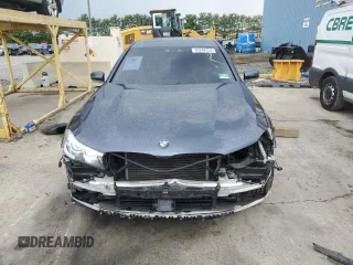 2017 BMW 7 Series 740i xDrive with VIN WBA7E4C32HGU99963, listed as a Copart auction lot 65848354 with 99,396 mi miles and Salvage Title. Bid and sale history available at carsss.com. Image 5.