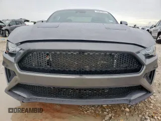 2021 Ford Mustang EcoBoost with VIN 1FA6P8TH0M5151554, listed as a Copart auction lot 60879875 with 20,014 mi miles and Salvage title. Bid and sale history available at DreamBid. Image 5.