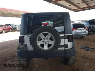 2010 Jeep Wrangler Unlimited Sport with VIN 1J4BA3H18AL161243, listed as a IAAI auction lot 41960370 with 89,004 mi miles. Bid and sale history available at carsss.com. Image 16.