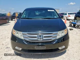 2011 Honda Odyssey Touring with VIN 5FNRL5H90BB033700, listed as a Copart auction lot 58602835 with 197,063 mi miles and Clean title. Bid and sale history available at DreamBid. Image 5.