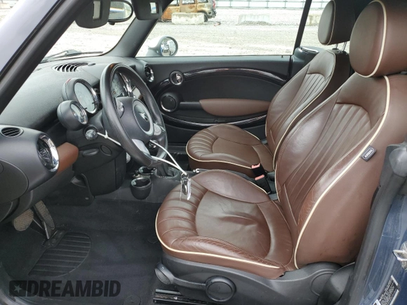 2009 MINI Convertible with VIN WMWMR33579TU96147, listed as a Copart auction lot 60124945 with 94,612 mi miles and Non repairable. Bid and sale history available at DreamBid. Image 7.