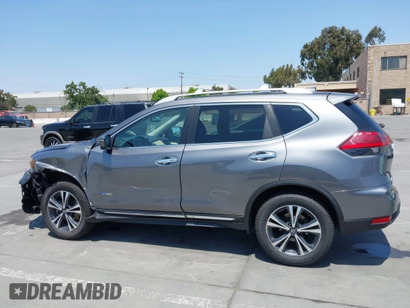 2017 Nissan Rogue SL Hybrid z VIN 5N1ET2MV9HC768242, wystawiony jako IAAI lot #42443514 z przebiegiem 84 879 mil mil oraz . Historia ofert i sprzedaży dostępna na DreamBid. Obrazek 14.