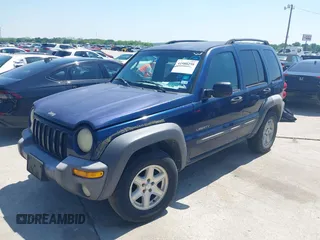2004 Jeep Liberty Sport with VIN 1J4GK48KX4W241129, listed as a IAAI auction lot 41980258 with 259,048 mi miles and . Bid and sale history available at DreamBid. Image 2.