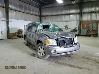 2005 GMC Envoy SLT z VIN 1GKDT13S652287033, wystawiony jako Copart lot #52508925 z przebiegiem 170 434 mil mil oraz Szkoda całkowita • Salvage title. Historia ofert i sprzedaży dostępna na DreamBid. Obrazek 12.