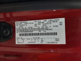2021 Ford F-150 XL with VIN 1FTFX1E55MFA44207, listed as a IAAI auction lot 42179647 with 67,900 mi miles and . Bid and sale history available at DreamBid. Image 9.
