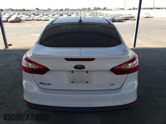 2012 Ford Focus SE with VIN 1FAHP3F20CL468537, listed as a Copart auction lot 64408615 with 173,753 mi miles and Salvage title. Bid and sale history available at DreamBid. Image 6.