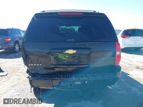 2013 Chevrolet Tahoe LTZ with VIN 1GNSKCE0XDR350970, listed as a IAAI auction lot 41704253 with 126,653 mi miles and . Bid and sale history available at DreamBid. Image 17.