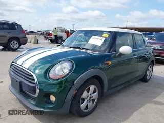 2016 MINI Hardtop 4 Door with VIN WMWXU1C52G2D10035, listed as a IAAI auction lot 42190544 with 106,383 mi miles and . Bid and sale history available at DreamBid. Image 20.