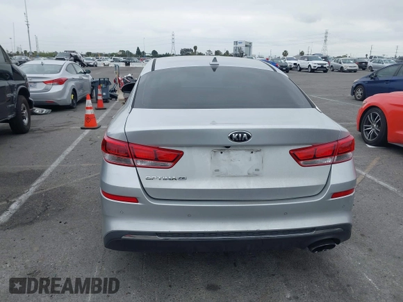 2019 Kia Optima LX z VIN 5XXGT4L3XKG285486, wystawiony jako IAAI lot #41872981 z przebiegiem 101 981 mil mil oraz . Historia ofert i sprzedaży dostępna na DreamBid. Obrazek 16.