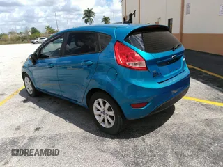 2013 Ford Fiesta SE with VIN 3FADP4EJ0DM202271, listed as a IAAI auction lot 41496985 with 174,624 mi miles. Bid and sale history available at carsss.com. Image 3.