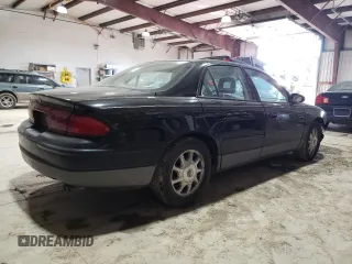 1999 Buick Regal GS with VIN 2G4WF5219X1424704, listed as a Copart auction lot 42899215 with 137,744 mi miles and Salvage Title. Bid and sale history available at carsss.com. Image 3.