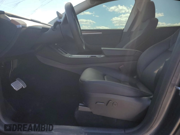 2023 Tesla Model Y Performance with VIN 7SAYGDEF3PF946496, listed as a Copart auction lot 50800315 with 15,077 mi miles and Salvage Title. Bid and sale history available at DreamBid. Image 7.