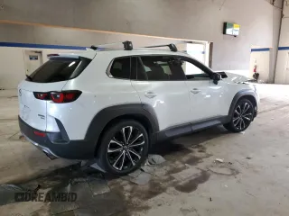 2023 Mazda CX-50 Premium Plus with VIN 7MMVABEY6PN132884, listed as a Copart auction lot 87292924 with 39,737 mi miles and Salvage Title. Bid and sale history available at DreamBid. Image 3.