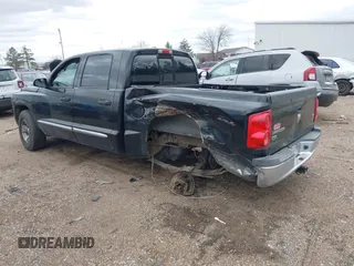 2008 Dodge Dakota Laramie with VIN 1D7HW58NX8S602604, listed as a IAAI auction lot 41717006 with 167,023 mi miles. Bid and sale history available at carsss.com. Image 3.
