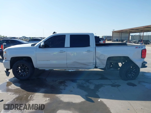 2016 Chevrolet Silverado 1500 LT with VIN 3GCUKREC8GG366278, listed as a IAAI auction lot 41993038 with 176,515 mi miles and . Bid and sale history available at DreamBid. Image 14.