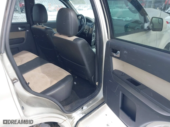 2010 Mercury Mariner Premier with VIN 4M2CN8H72AKJ05699, listed as a IAAI auction lot 41631468 with 205,563 mi miles. Bid and sale history available at carsss.com. Image 8.