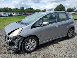 2009 Honda Fit Sport with VIN JHMGE88439S029286, listed as a Copart auction lot 63357784 with 112,705 mi miles and Salvage Title. Bid and sale history available at carsss.com. Image 1.