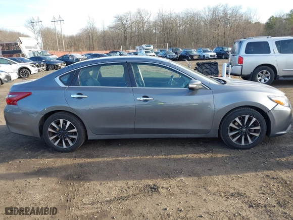2018 Nissan Altima 2.5 SV with VIN 1N4AL3AP9JC166273, listed as a IAAI auction lot 41694295 with 83,864 mi miles. Bid and sale history available at carsss.com. Image 13.