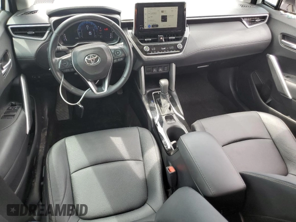 2023 Toyota Corolla Cross XLE z VIN 7MUDAAAG7PV051492, wystawiony jako Copart lot #61185635 z przebiegiem 79 364 mil mil oraz Nie do naprawy • Non repairable. Historia ofert i sprzedaży dostępna na DreamBid. Obrazek 8.