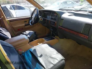 1997 Jeep Grand Cherokee Limited with VIN 1J4GZ78Y1VC658515, listed as a IAAI auction lot 41897266 with 164,033 mi miles and . Bid and sale history available at DreamBid. Image 5.