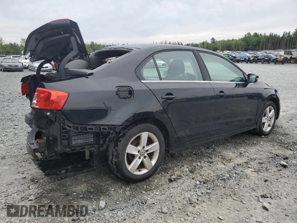 2014 Volkswagen Jetta Comfortline с VIN 3VWDL7AJ2EM366052, выставлен на аукционе Copart как лот 69010344 с пробегом 210 092 миль миль и Списание • Salvage title. История ставок и продаж доступна на DreamBid. Изображение 3.