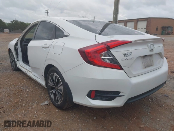 2017 Honda Civic EX-L with VIN 2HGFC1F72HH658763, listed as a IAAI auction lot 41972317 with 166,168 mi miles and . Bid and sale history available at DreamBid. Image 3.