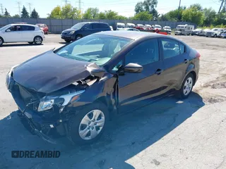 2018 Kia Forte LX with VIN 3KPFK4A70JE217385, listed as a IAAI auction lot 39955381 with 99,060 mi miles. Bid and sale history available at carsss.com. Image 2.