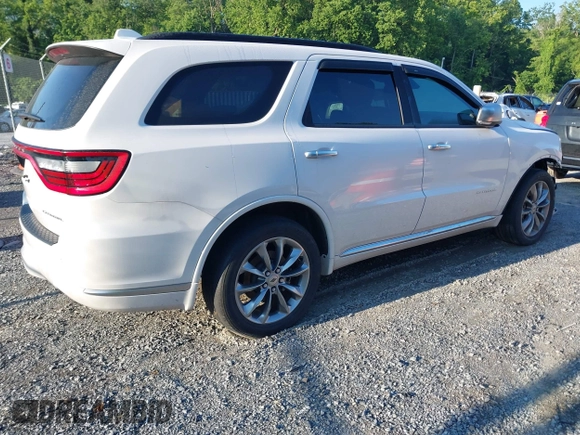 2021 Dodge Durango Citadel with VIN 1C4RDJEG7MC853118, listed as a IAAI auction lot 42622475 with 49,386 mi miles and . Bid and sale history available at DreamBid. Image 4.