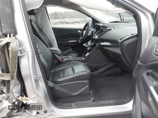 2014 Ford Escape Titanium with VIN 1FMCU9J94EUE51012, listed as a IAAI auction lot 41497105 with 153,031 mi miles. Bid and sale history available at carsss.com. Image 5.