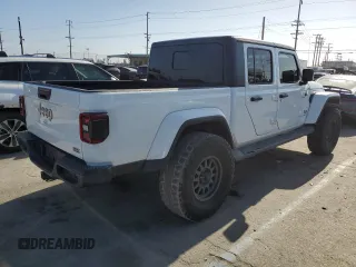 2021 Jeep Gladiator High Altitude с VIN 1C6HJTFGXML504007, выставлен на аукционе Copart как лот 61217695 с пробегом 70 584 миль миль и Списание • Salvage title. История ставок и продаж доступна на DreamBid. Изображение 3.