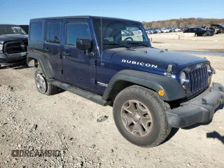 2013 Jeep Wrangler Unlimited Rubicon 10th Anniversary с VIN 1C4HJWFG7DL559539, выставлен на аукционе Copart как лот 81675894 с пробегом 99 425 миль миль и Списание • Salvage title. История ставок и продаж доступна на DreamBid. Изображение 4.