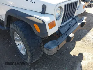 2005 Jeep Wrangler SE with VIN 1J4FA29S95P363770, listed as a IAAI auction lot 41362056 with 140,540 mi miles. Bid and sale history available at carsss.com. Image 6.
