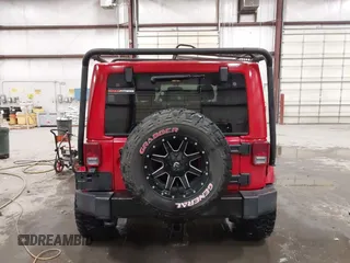 2011 Jeep Wrangler Sahara with VIN 1J4AA5D10BL593534, listed as a IAAI auction lot 41551416 with 101,716 mi miles and . Bid and sale history available at DreamBid. Image 16.