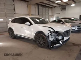 2017 Mazda CX-9 Grand Touring z VIN JM3TCADY5H0132572, wystawiony jako IAAI lot #41421008 z przebiegiem 66 656 mil mil oraz . Historia ofert i sprzedaży dostępna na DreamBid. Obrazek 1.