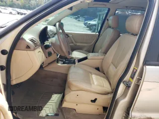 2002 Mercedes-Benz M-Class with VIN 4JGAB54E72A322046, listed as a Copart auction lot 74393084 with 128,015 mi miles and Salvage Title. Bid and sale history available at carsss.com. Image 7.