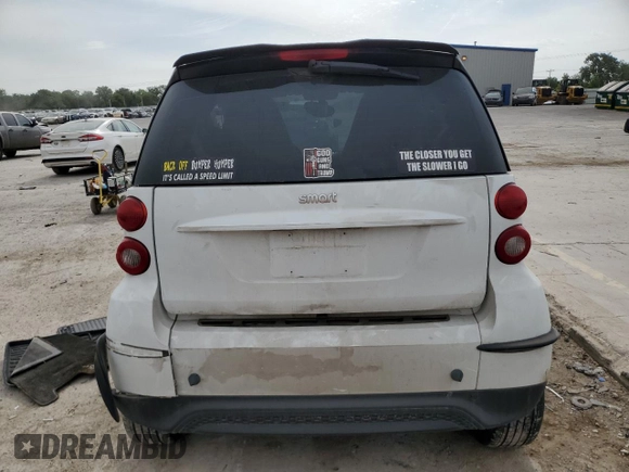 2013 Smart fortwo Pure с VIN WMEEJ3BA9DK618746, выставлен на аукционе Copart как лот 56752885 с пробегом 80 293 миль миль и Списание • Salvage title. История ставок и продаж доступна на DreamBid. Изображение 6.