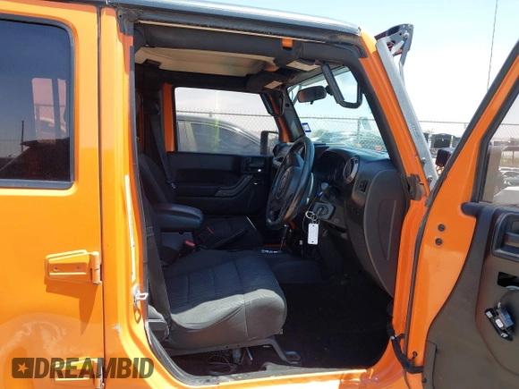 2012 Jeep Wrangler Unlimited Sport RHD with VIN 1C4BJWKGXCL221613, listed as a IAAI auction lot 42327004 with 129,375 mi miles and . Bid and sale history available at DreamBid. Image 5.