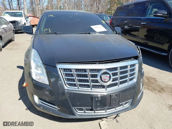 2013 Cadillac XTS Luxury with VIN 2G61R5S33D9184878, listed as a IAAI auction lot 41644213 with 113,293 mi miles. Bid and sale history available at carsss.com. Image 12.